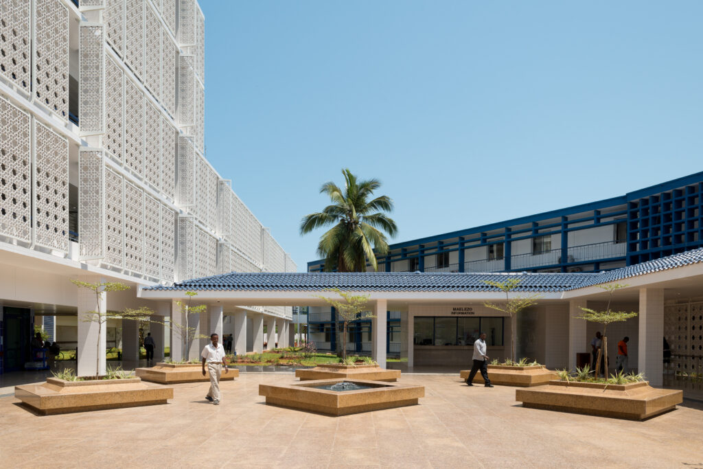 Courtyard, old hospital (center and right), and Phase 2 and veranda concourse (center and left)