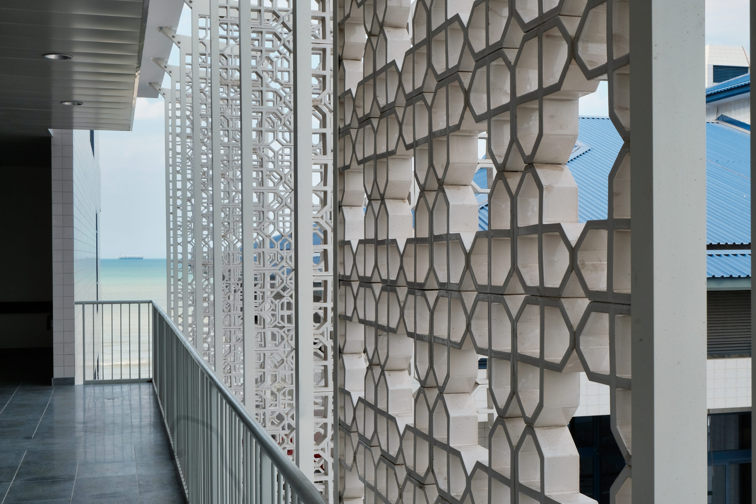 Ocean view and ceramic block screens from lift lobby
