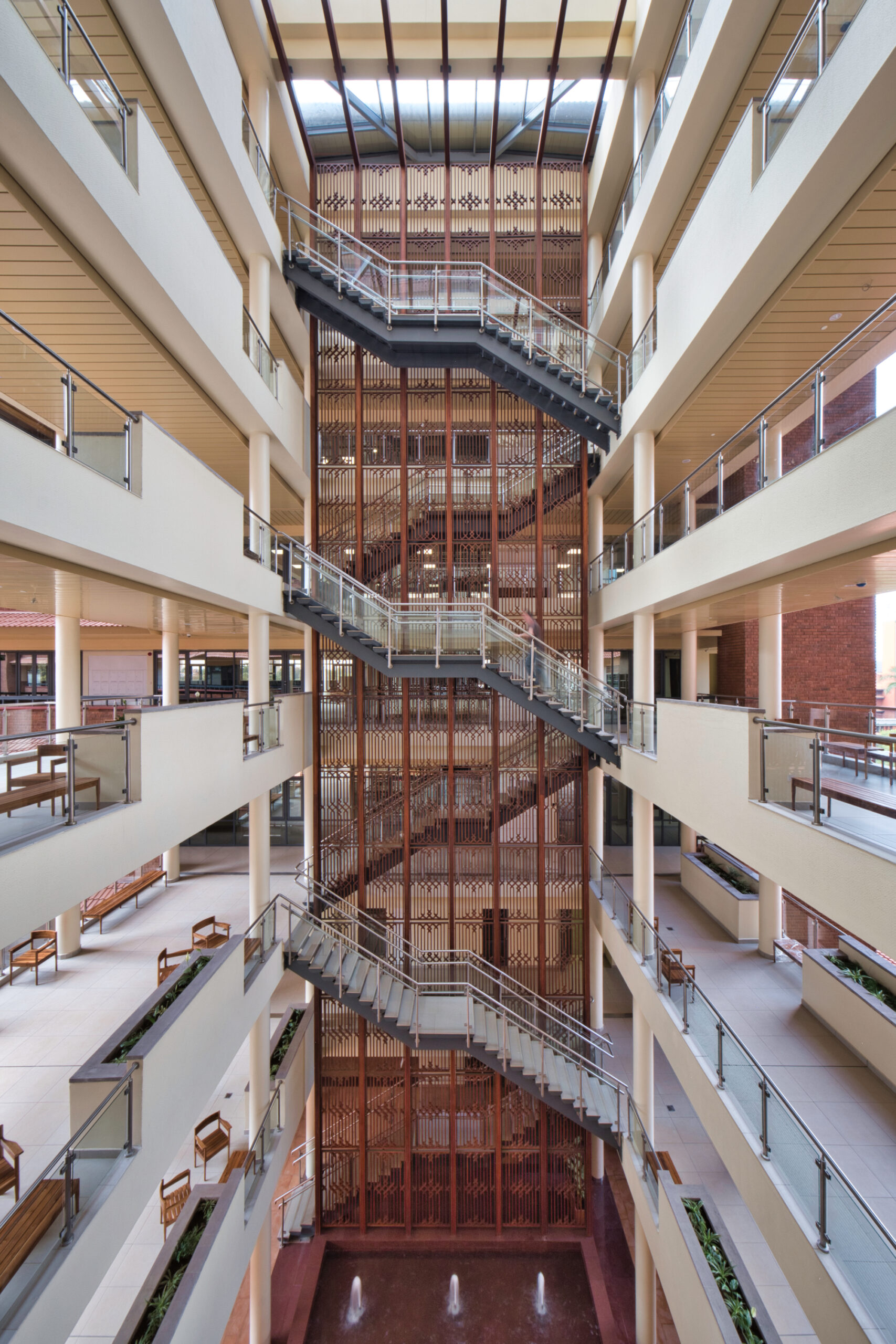 Atrium showing full seven stories of timber screen and stair
